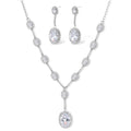 Elegant white gold plated jewelry set with oval cubic zirconia stones in halo settings, featuring Y-necklace and drop earrings.