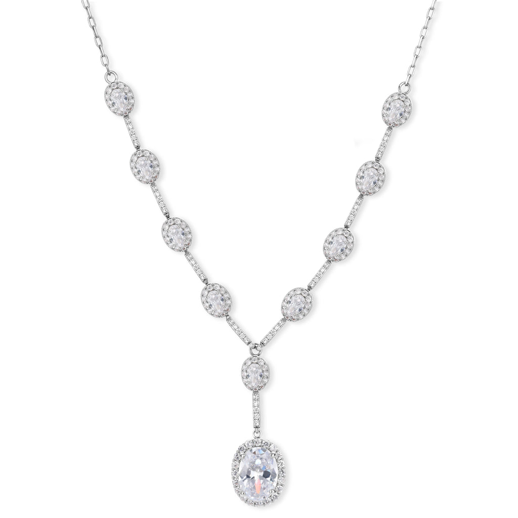 Elegant white gold plated jewelry set with oval cubic zirconia stones in halo settings, featuring Y-necklace and drop earrings.